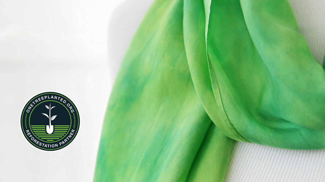 hand dyed green scarf and One Tree Planted partnership logo